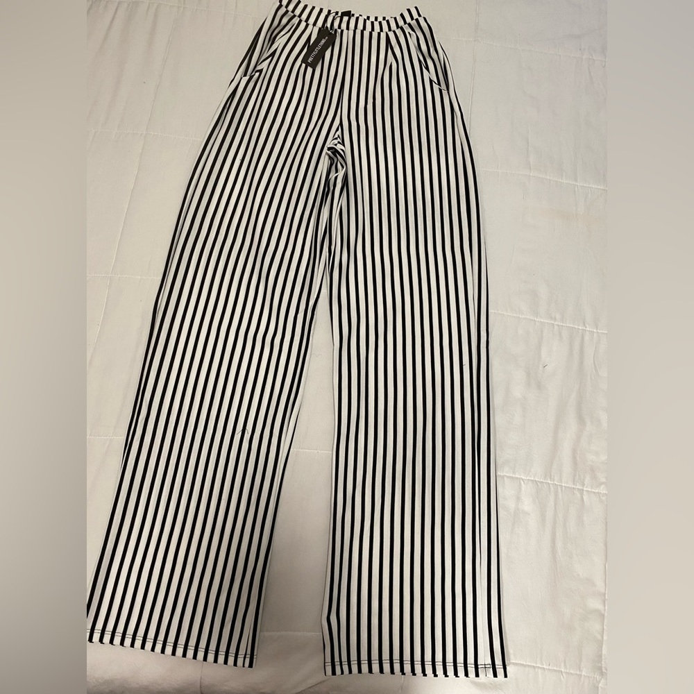 Black and white striped trousers